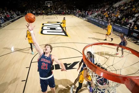 Mike Walz skies for a rebound at VCU