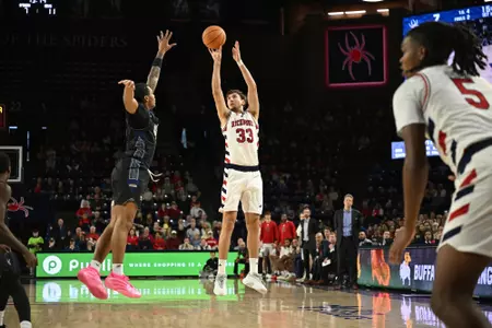 Apostolos Roumoglou shoots a three-pointer during a game