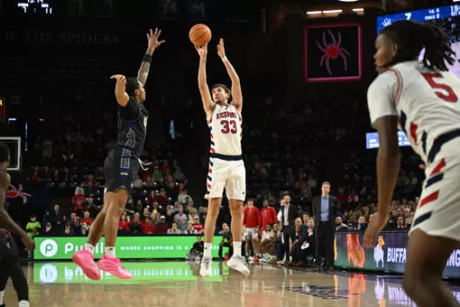 Apostolos Roumoglou shoots a three-pointer during a game