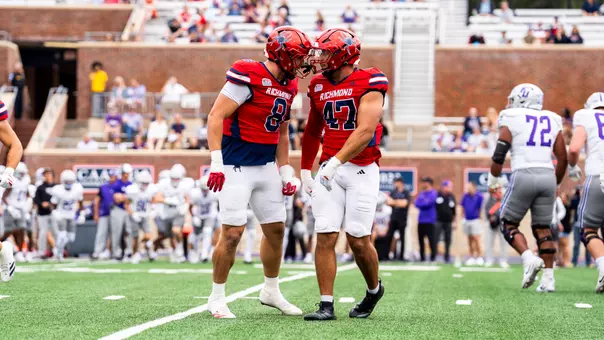 Braxton Lassiter and Daniel Sellers celebrate a sack against Furman on Sept. 29, 2026