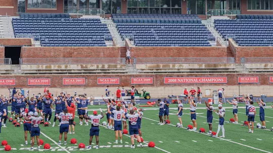 University of Richmond football team stetching