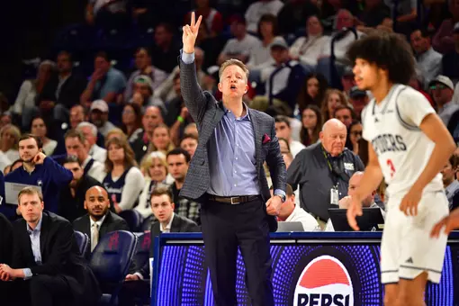 Chris Mooney calls a play from the bench