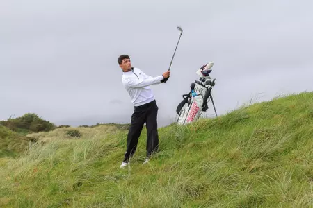 Mason Deal hits a shot out of the rough