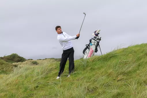 Mason Deal hits a shot out of the rough