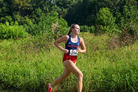 Kiera Lowman races through a field