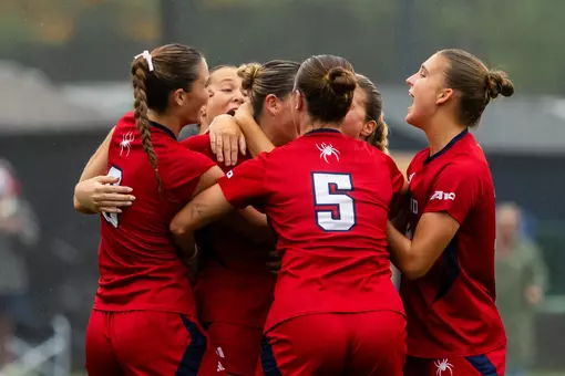 The Spiders celebrate a goal against Davidson