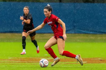 Christina Stamoulacatos collects the ball in the rain
