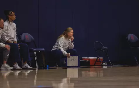 WBB head coach Alisa Kresge watches the play develop down court during a scrimmage