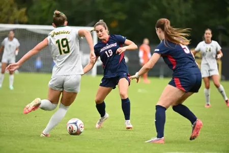 Paige West attempts to reclaim the ball