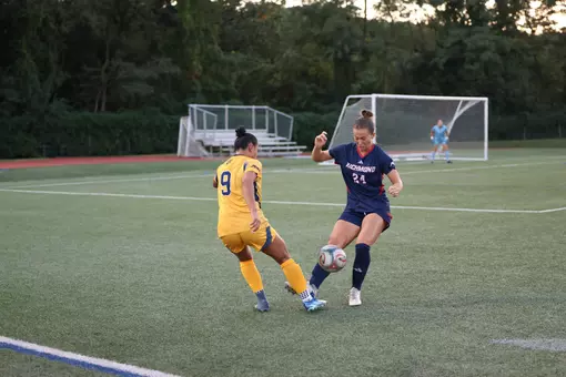 Sydney Bortz attempts a clearance