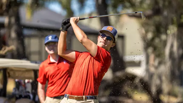Carson Baez watches his tee shot from the tee box