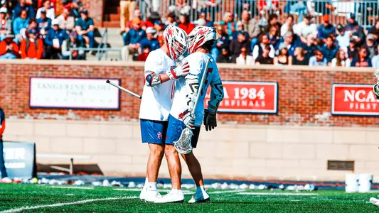 Aidan O'Neil and Jack Riccardi Celebrate a goal during Richmond's 18-12 win over Virginia on Valentine's Day 2026