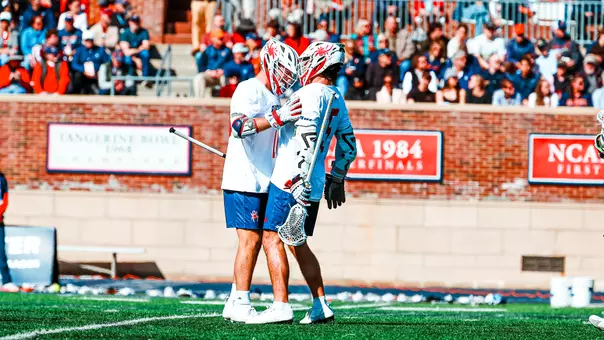 Aidan O'Neil and Jack Riccardi Celebrate a goal during Richmond's 18-12 win over Virginia on Valentine's Day 2026