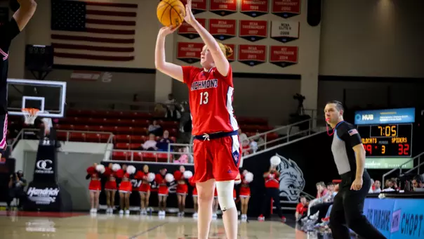Dewey shooting a three pointer
