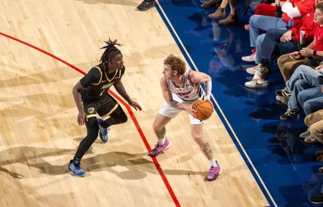An overhead shot of Will Johston facing a defender