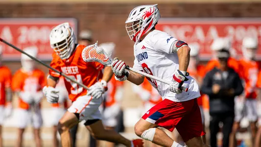 Jack Pilling clears the ball against Mercer