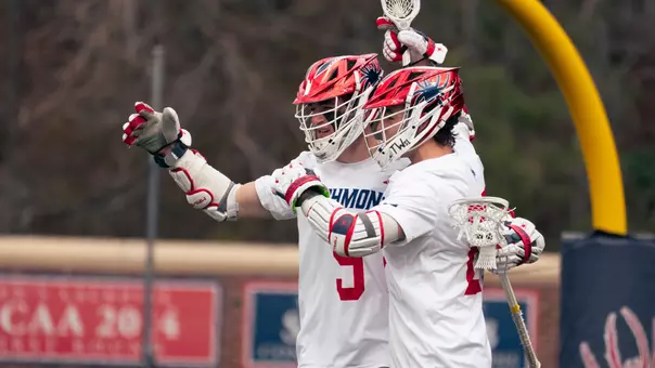 Cole Hayden and Lucas Littlejohn celebrate a goal against Lehigh on Feb. 21, 2026