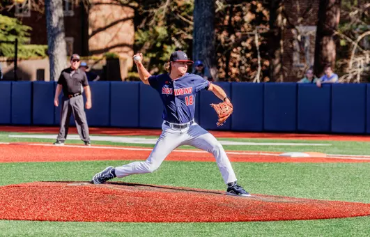 Aaron Van Tuyle strides off the pitching rubber towards home plate