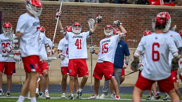 Kaleb Griffith and William Schnieder celebrate Hunter Smith's goal against Georgetown on March 7,2026