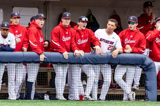 The dug-out cheers on a big play