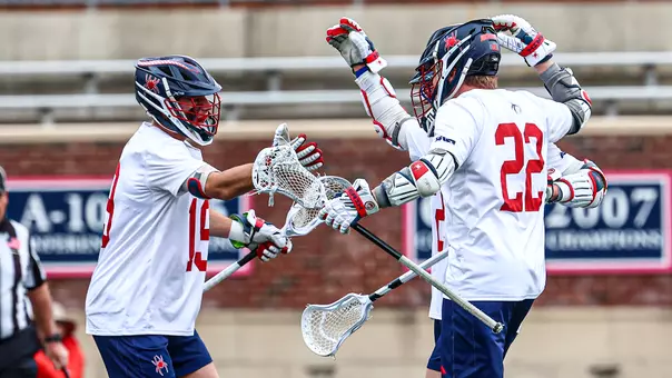The Richmond men's lacrosse team celebrates a goal against Delaware on March 14, 2026