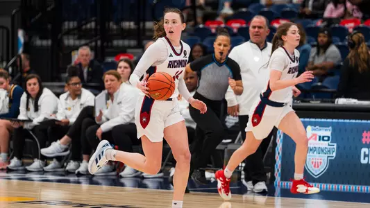 Doogan dribbling the ball down the court vs La Salle