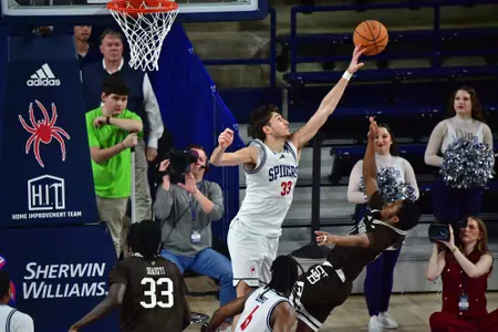 Apostolos Roumoglou blocks a shot