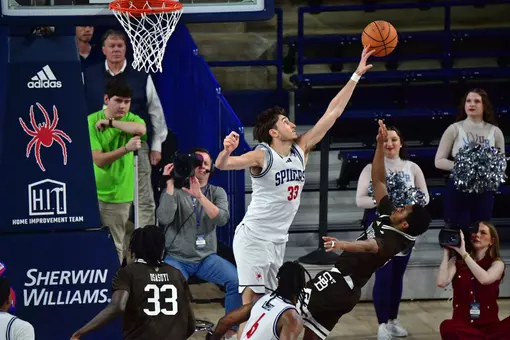 Apostolos Roumoglou blocks a shot
