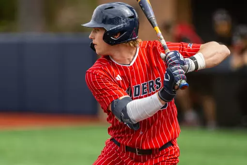 Evan Wilson waits for the pitch with his hands ready to swing