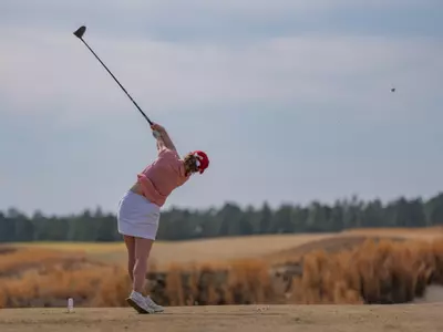 A shot from behind Hannah Lydic as she tees off with her driver