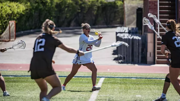 Bridget Lonsinger looks to pass against St. Bonaventure on March 28, 2026