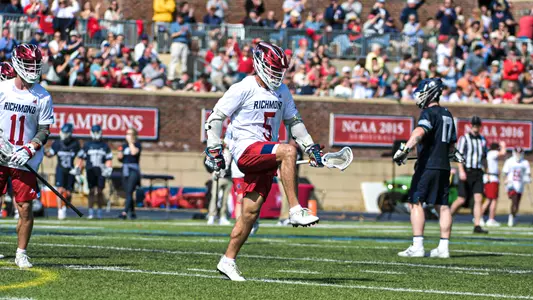 Aidan O'Neil high-stepping after a goal against Georgetown on March 7, 2026