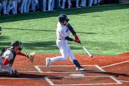 Ryan Recio makes contact with the ball for a double