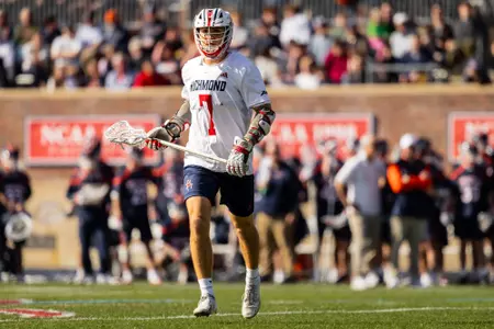 Joe Sheridan carries the ball during Richmond's 18-12 win over Virginia on Feb. 14, 2026