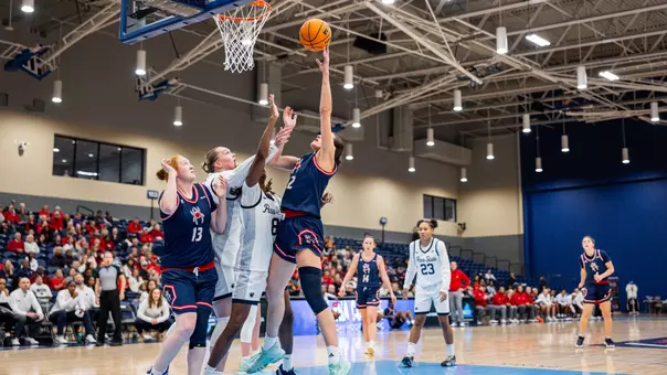 Ullstrom shooting a layup vs PSU