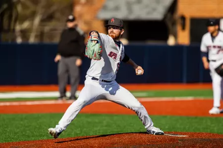 Joey Giordano strides towards home plate to throw the pitch