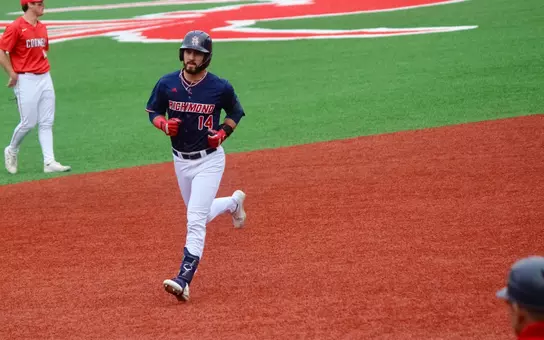 Ryan Recio trots around the bases after hitting a home run