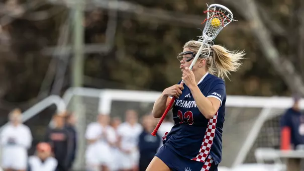 Alexis Morton dodging defender vs UVA