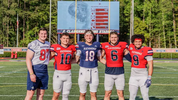 Richmond Football's five captains pose at midfield