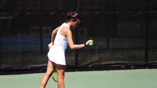 Abby Lee about to serve the ball
