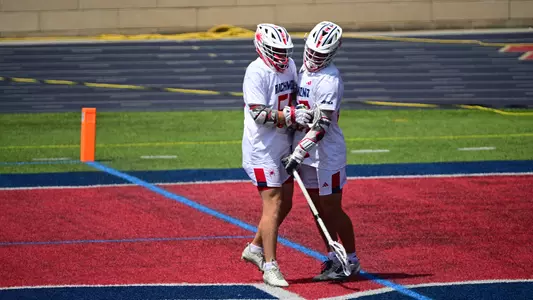 Evan O'Neil and Lucas Littlejohn celebrate a goal against Saint Joseph's on April 18, 2026