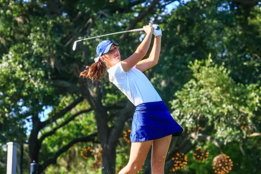 Katie Magner hits an iron shot off the tee