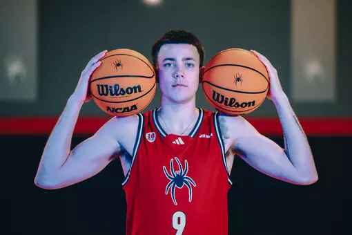 Jack McCaffery holds two balls next to his ears