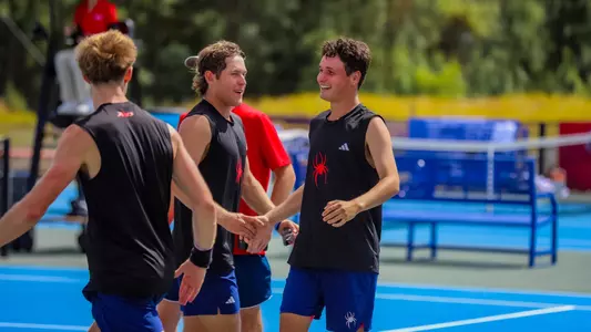 Photo of Dylan Atkinson after beating George Mason