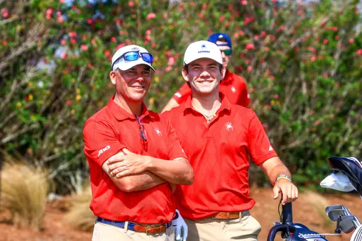 Adam Decker and Lucas Rizo-Patron smile on the tee box