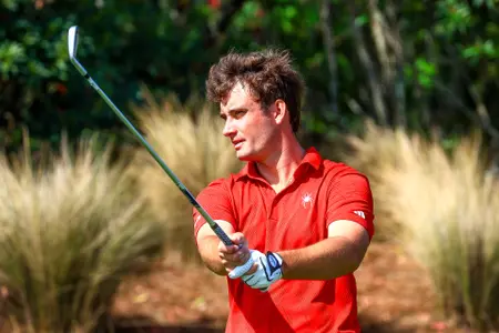 Jack LaPiana stares down his tee shot
