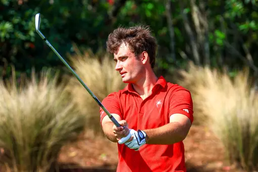 Jack LaPiana stares down his tee shot