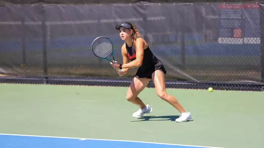 Barbulescu chasing a ball in a tennis match