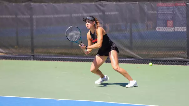 Barbulescu chasing a ball in a tennis match