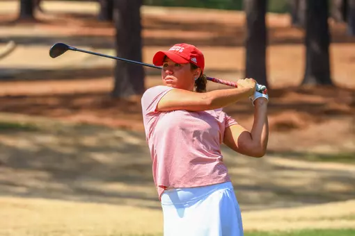 Maya Beasley with a wide follow through after her approach shot